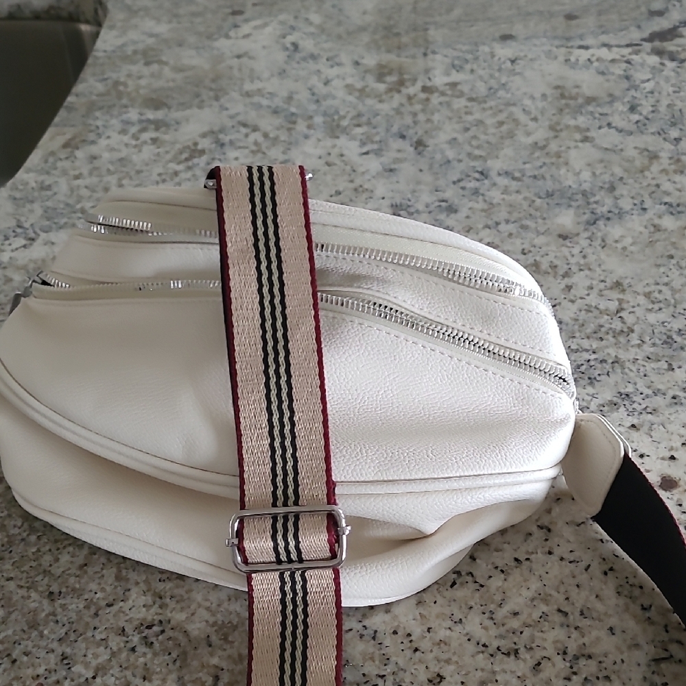 White Sporty Crossbody Bag with Adjustable Striped Strap. Brand new